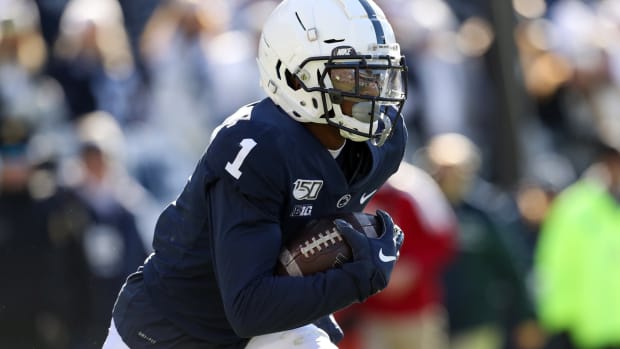 Nov 16, 2019; University Park, PA, USA; Penn State Nittany Lions wide receiver KJ Hamler (1) runs with the ball on a punt return during the first quarter against the Indiana Hoosiers at Beaver Stadium.